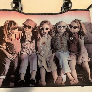 Adorable purse with cute little girls.